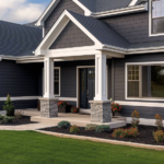 Home with dark siding and accent details