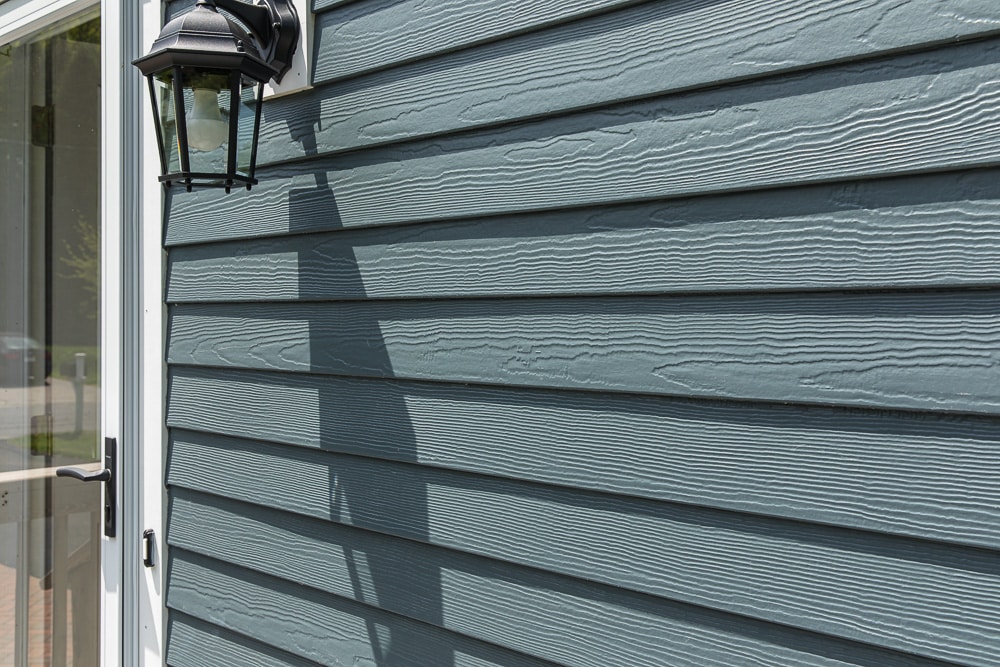 close up of Evening Blue James Hardie siding in Acton