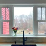 double hung window above the sink offers improved operability