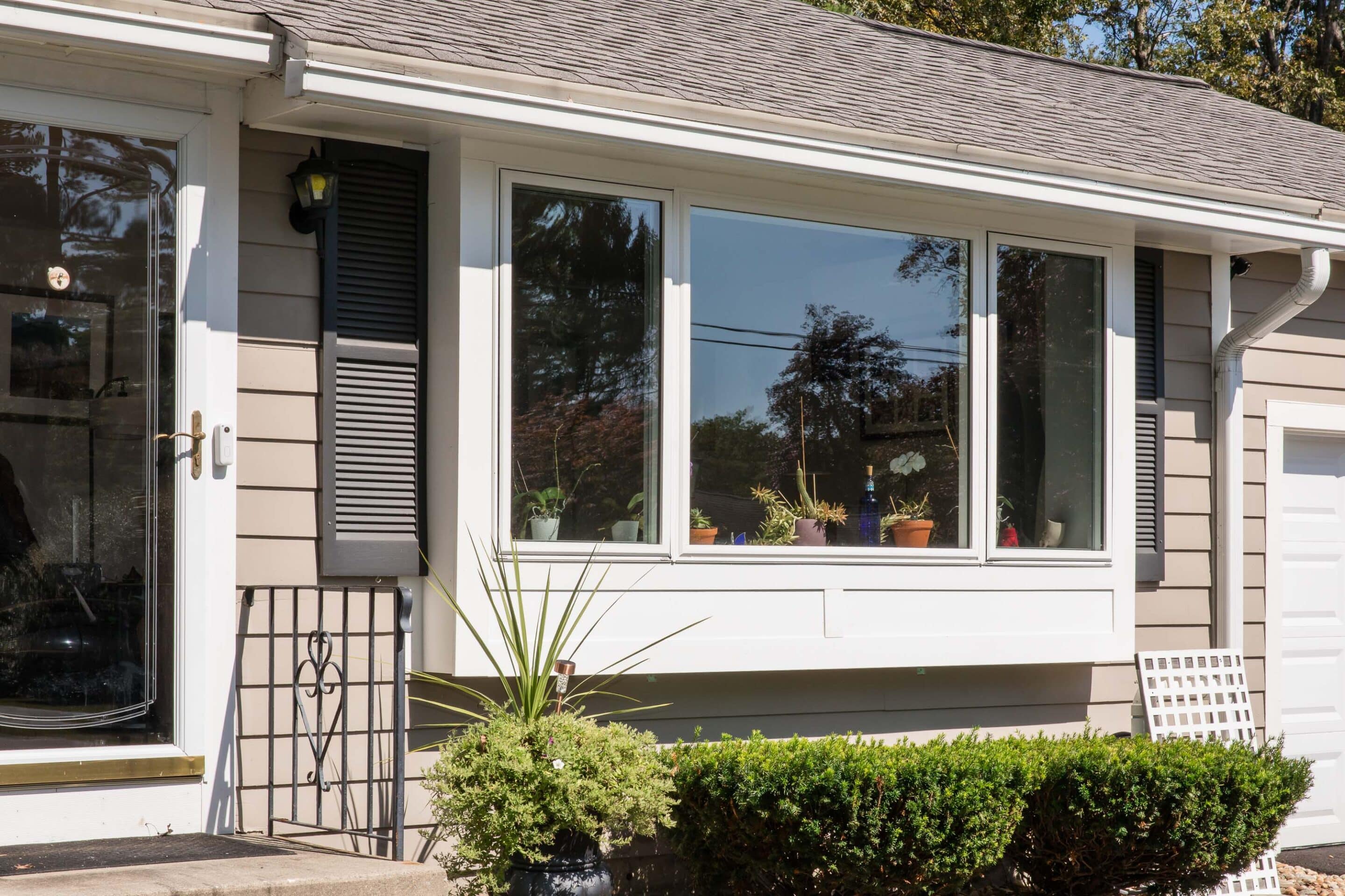 New 'box bay' window that replaced an older bow window on the front of a ranch style house